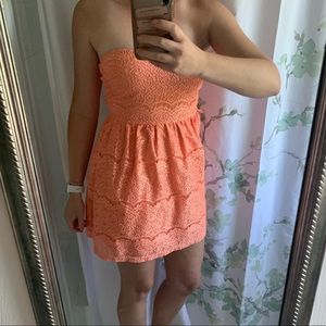 Coral, strapless croquet dress.